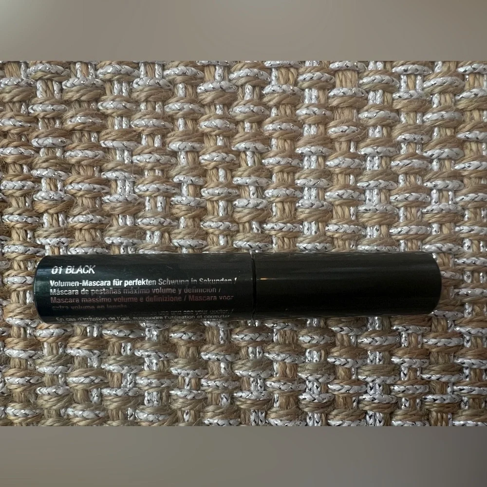 Clinique cosmetic makeup collection - bag, mascara, eyeliner, and makeup remover